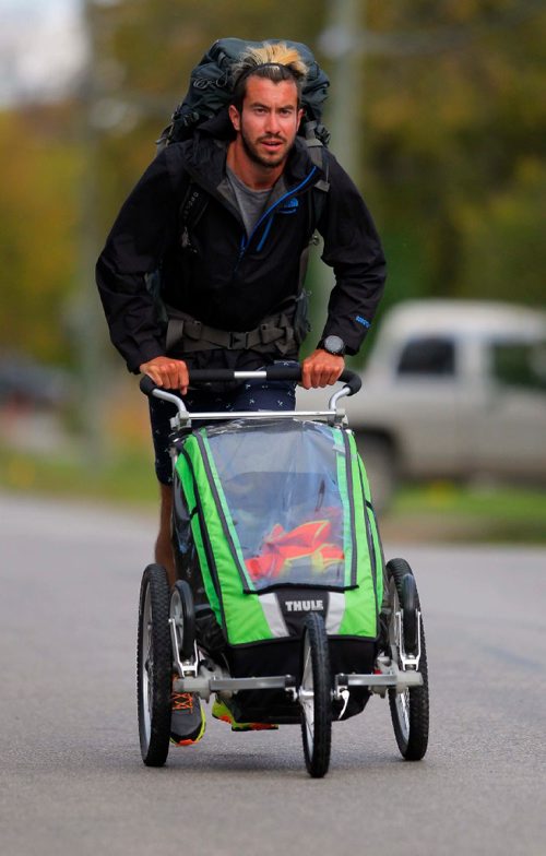 BORIS MINKEVICH / WINNIPEG FREE PRESS
Photo of 27 year old Winnipeg born cross-Canada runner Dylan Gray with the equipment he runs with. He's raising awareness and money for the Against Malaria Foundation. Photo taken in Charleswood. Gordon Sinclair column. Sept. 27, 2016