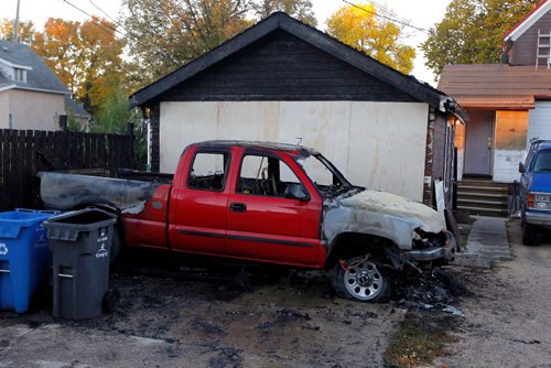 BORIS MINKEVICH / WINNIPEG FREE PRESS
BREAKING NEWS - Burned out truck in the back of 389 William Newton Ave. One of many fires in the area overnight.  Sept. 28, 2016