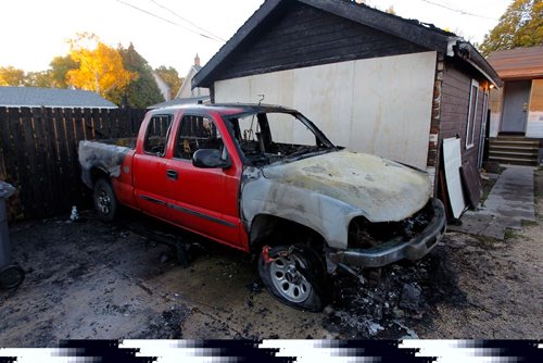 BORIS MINKEVICH / WINNIPEG FREE PRESS
BREAKING NEWS - Burned out truck in the back of 389 William Newton Ave. One of many fires in the area overnight.  Sept. 28, 2016