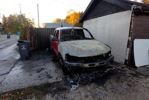 BORIS MINKEVICH / WINNIPEG FREE PRESS
BREAKING NEWS - Burned out truck in the back of 389 William Newton Ave. One of many fires in the area overnight.  Sept. 28, 2016