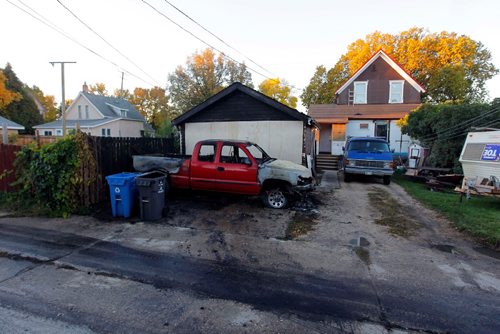 BORIS MINKEVICH / WINNIPEG FREE PRESS
BREAKING NEWS - Burned out truck in the back of 389 William Newton Ave. One of many fires in the area overnight.  Sept. 28, 2016