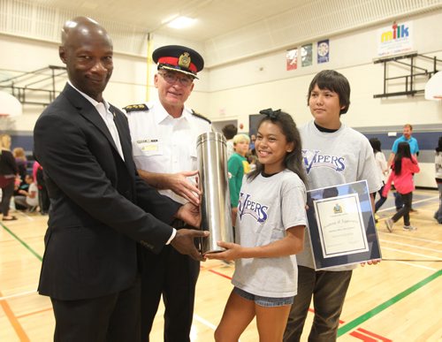 RUTH BONNEVILLE / WINNIPEG FREE PRESS

Former Police Chief Devon Clunis,  acting Chief of Police, Art Stannard and Salisbury Morse Place School students Kianna Murriel and Dien Parisian present a time capsule Thursday created by students from their school that is to be placed in the new police Headquarters building, and sealed for fifty years.  The Winnipeg Police Service is carrying on a tradition that started with the former police headquarters when it was built 50 years ago.  The theme of the time capsule created by the students is Our Community.

September 29, 2016

