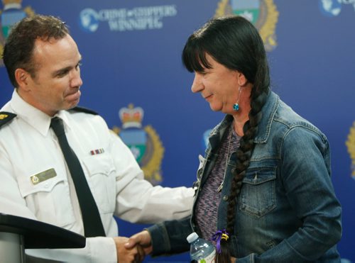 WAYNE GLOWACKI / WINNIPEG FREE PRESS

At right, Arlene Last-Kolb lost her 24-year-old son Jessie to a fentanyl drug overdose spoke at the Police news conference with Winnipeg Police Deputy Chief Danny Smyth regarding the carfentanil seizure earlier this month. The news conference was held Thursday in the WPS Headquarters building  Carol Sanders Sept. 29 2016