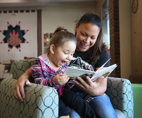 RUTH BONNEVILLE / WINNIPEG FREE PRESS

Three-year-old Sienna Wesley lights-up with a bright smile as she reads a children's book on animals with her mom, Stephanie Wesley, in the new Mothering Project Clinic, part of Mount Carmel Clinic, on Thursday.  

September 29, 2016

