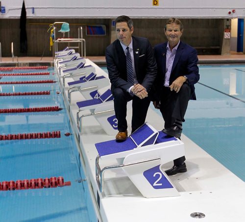 BORIS MINKEVICH / WINNIPEG FREE PRESS
The City of Winnipeg, together with 2017 Canada Summer Games representatives, announced the reopening of the Pan Am Pool on October 1st. The press event showcased facility upgrades in anticipation of the 2017 Canada Summer Games. (left) Winnipeg Mayor Brian Bowman and (right) Hubert Mesman, Co-Chair of the 2017 Canada Summer Games Host Society pose for a photo on one of the new bulk heads in the pool. Photo taken at Pan Am Pool, 25 Poseidon Bay. Sept. 30, 2016
