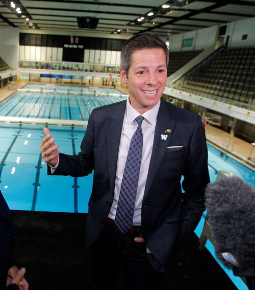 BORIS MINKEVICH / WINNIPEG FREE PRESS
The City of Winnipeg, together with 2017 Canada Summer Games representatives, announced the reopening of the Pan Am Pool on October 1st. The press event showcased facility upgrades in anticipation of the 2017 Canada Summer Games. Winnipeg Mayor Brian Bowman does an interview on the diving platform in this photo. Photo taken at Pan Am Pool, 25 Poseidon Bay. Sept. 30, 2016