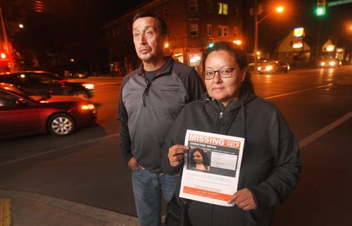 JOE BRYKSA / WINNIPEG FREE PRESSGeorge and Melinda Wood stand on Ellice Ave with a missing persons poster  Their daughter 21 year old Christine Wood from Oxford House First Nation went missing Oct 19 while visiting Winnipeg. Her parents have been searching Winnipeg since, hoping for a sighting.  They have been searching each night driving through many neighborhoods in Winnipeg. Sept 29, 2016 -(See Melissa Martin story)