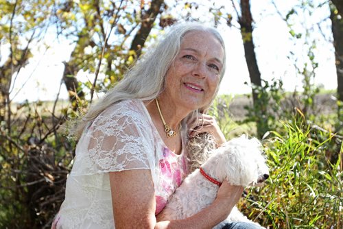 RUTH BONNEVILLE / WINNIPEG FREE PRESS

Long-time breast cancer survivor, Iris Groinus, who participated in a long-term research project on follow-up treatment.  In your yard on the farm with her dog, Poppy.  

See Joel Schlesinger story.  
September 30, 2016


