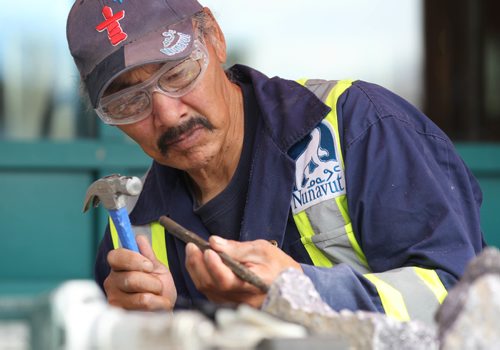 RUTH BONNEVILLE / WINNIPEG FREE PRESS

Paul Malliki works on a carving at the Forks during the WAG's meet the artist event Saturday. 
Sculptor Malliki was born in am outpost camp near Igloolik, Nunavut.  
See Jessica's story.  
October 1st, 2016

