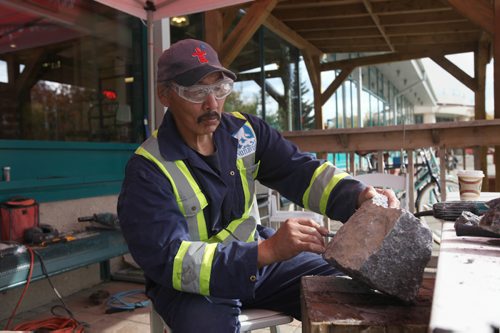 RUTH BONNEVILLE / WINNIPEG FREE PRESS

Paul Malliki works on a carving at the Forks during the WAG's meet the artist event Saturday. 
Sculptor Malliki was born in am outpost camp near Igloolik, Nunavut.  
See Jessica's story.  
October 1st, 2016
