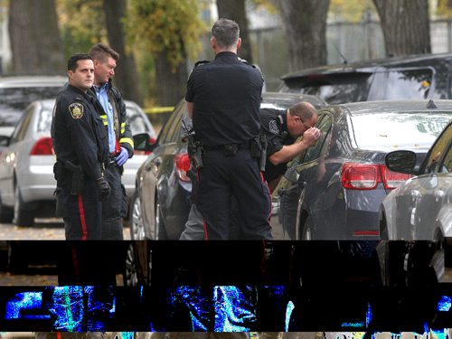 JOE BRYKSA / WINNIPEG FREE PRESS Winnipeg Police and emergency crews are on the scene of College Ave where they have located two bodies in a car parked on the street- Two neighbors verified the discovery. Oct 03, 2016 -(See Carol Sanders story)