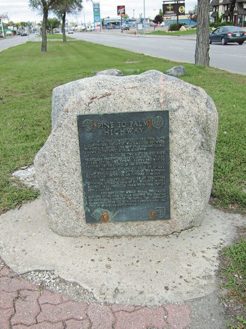 Canstar Community News Photo by Jeannette Timmerman
This plaque at Pembina Highway and Stafford Street marks the northern end of the Pine to Palm Highway.