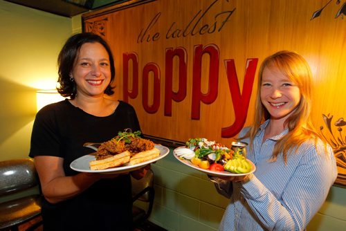 BORIS MINKEVICH / WINNIPEG FREE PRESS
FOOD - Venues on Sherbrook Street. 103 Sherbrook is where the The Tallest Poppy is. Owner Talia Syrie with the Chicken and Waffles, with Manager Eileen Fowler holding the Cobb salad. Oct. 3, 2016