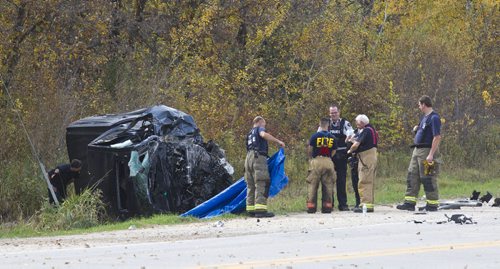 MIKE DEAL / WINNIPEG FREE PRESS
A pick up truck sits crumpled at the side of the Garven Road close to where it hit a gravel truck Monday morning. The driver was pronounced dead at the scene.
161003 - Monday, Oct. 03, 2016
