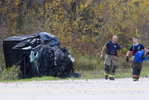 MIKE DEAL / WINNIPEG FREE PRESS
A pick up truck sits crumpled at the side of the Garven Road close to where it hit a gravel truck Monday morning. The driver was pronounced dead at the scene.
161003 - Monday, Oct. 03, 2016

