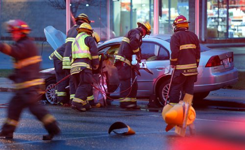 WAYNE GLOWACKI / WINNIPEG FREE PRESS


Winnipeg Fire Fighters used the jaws of life to open the door of one of the two vehicles that collided on Sargent Ave. and Erin St. Tuesday morning. Two ambulances were at the scene checking out occupants of the vehicles.Oct.4 2016