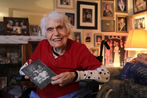 RUTH BONNEVILLE / WINNIPEG FREE PRESS

Ninety-nine-year-old Sophie Nemi is alive and well as she smiles while holding a picture of herself in 1948 with her oldest 3 of six children in her wheelchair in her seniors suite in the North End Tuesday afternoon.  Her son Dan Nemi was told by hospital officials 3x that she was dead.  
See Kevin Rollason's story.  

October 04, 2016

