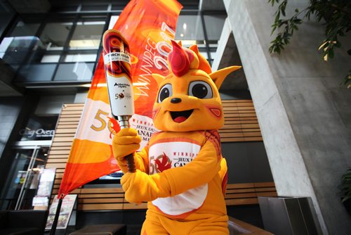 RUTH BONNEVILLE / WINNIPEG FREE PRESS

Canada Summer Games mascot holds the torch that will be carried through the torch relay during 2017 games in Winnipeg next summer.  
An official unveiling of the torch took place at  the Manitoba Hydro Building Wednesday.

October 05, 2016

