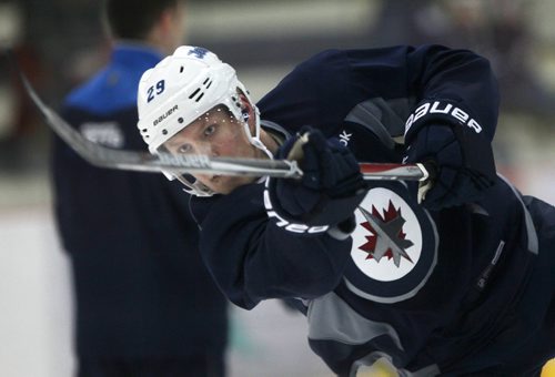JOE BRYKSA / WINNIPEG FREE PRESSWinnipeg Jets Patrick Laine lets a shot go during a light skate Thursday in Winnipeg. The team less their top line are on their way to Edmonton this afternoon for a pre-season game against the Oilers  . Oct 06, 2016 -(See story)