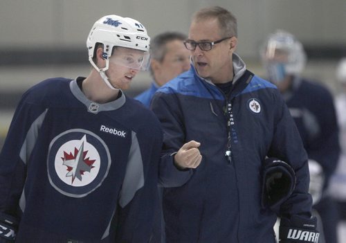 JOE BRYKSA / WINNIPEG FREE PRESSWinnipeg Jets Kyle Connor gets some advice form Jets coach Paul Maurice during a light skate Thursday in Winnipeg. The team less their top line are on their way to Edmonton this afternoon for a pre-season game against the Oilers  . Oct 06, 2016 -(See story)