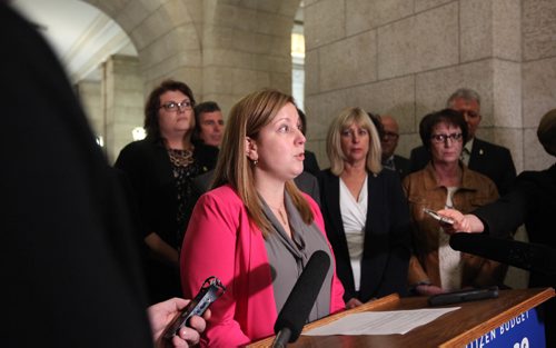 RUTH BONNEVILLE  /  WINNIPEG FREE PRESS

Fort Richmond MLA  Sarah Guillemard talks with the media about perceived harassment by NDP members against women as they stood to vote inside the chamber recently during scrum Thursday afternoon after question period.  

October 06, 2016
