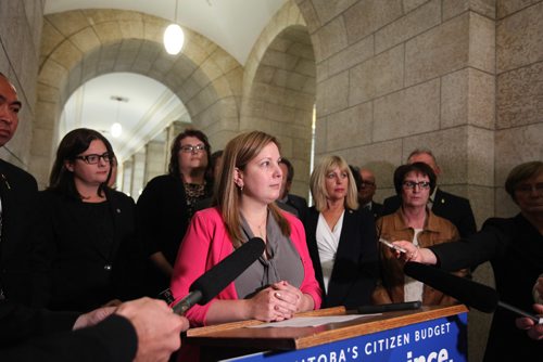 RUTH BONNEVILLE  /  WINNIPEG FREE PRESS

Fort Richmond MLA  Sarah Guillemard talks with the media about perceived harassment by NDP members against women as they stood to vote inside the chamber recently during scrum Thursday afternoon after question period.  

October 06, 2016