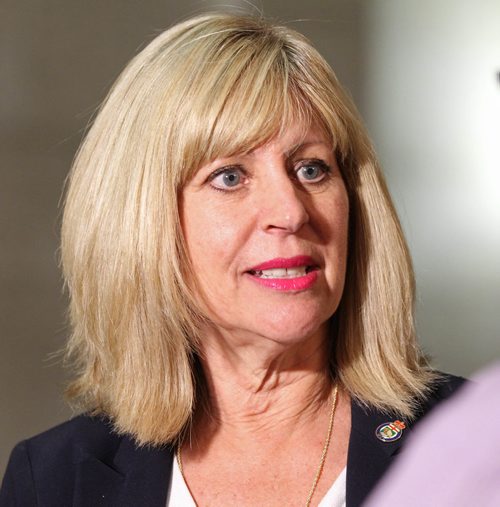 RUTH BONNEVILLE  /  WINNIPEG FREE PRESS

Minister of Sustainable Development Cathy Cox talks to reporter  during scrum at Legislative Building Thursday afternoon after question period.  

October 06, 2016
