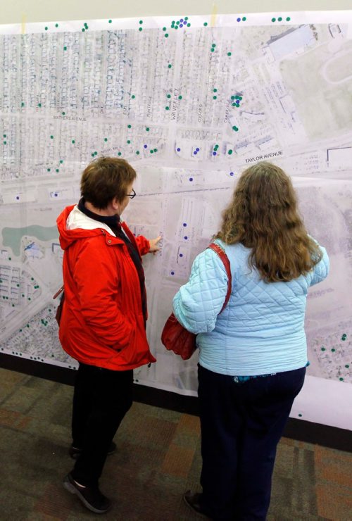BORIS MINKEVICH / WINNIPEG FREE PRESS
(L-R) Barbara Mackenzie and Patricia MacQuarrie look at a map on the wall. Winnipeggers attended a public open house about the Waverley Underpass project at the Caboto Centre, 1055 Wilkes Avenue. The open house was a opportunity for the public to view the detailed design for the underpass, learn about pedestrian and cycling infrastructure, intersection and road improvements, as well as construction timelines and detours. There was two sessions 3:30 p.m. to 5:30 p.m. and 7:00 p.m. to 9:00 p.m. These photos were shot in the 7-9pm session. Oct. 6, 2016
