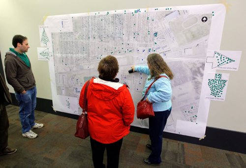 BORIS MINKEVICH / WINNIPEG FREE PRESS
(L-R) Norman Wood, Barbara Mackenzie, and Patricia MacQuarrie look at a map on the wall. Winnipeggers attended a public open house about the Waverley Underpass project at the Caboto Centre, 1055 Wilkes Avenue. The open house was a opportunity for the public to view the detailed design for the underpass, learn about pedestrian and cycling infrastructure, intersection and road improvements, as well as construction timelines and detours. There was two sessions 3:30 p.m. to 5:30 p.m. and 7:00 p.m. to 9:00 p.m. These photos were shot in the 7-9pm session. Oct. 6, 2016