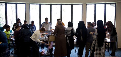 MIKE DEAL / WINNIPEG FREE PRESS
A potluck supper hosted by Refuge Winnipeg for the three Syrian refugee families who arrived here last October and all the people who privately sponsored them Monday afternoon at the First Unitarian Universalist Church of Winnipeg.
161010 - Monday, October 10, 2016 - 

