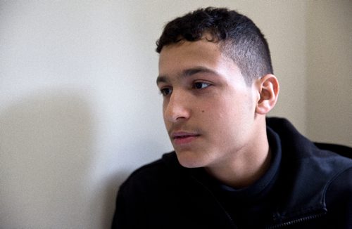 MIKE DEAL / WINNIPEG FREE PRESS
Omar, 15, at a potluck supper hosted by Refuge Winnipeg for the three Syrian refugee families who arrived here last October and all the people who privately sponsored them Monday afternoon at the First Unitarian Universalist Church of Winnipeg.
161010 - Monday, October 10, 2016 - 

