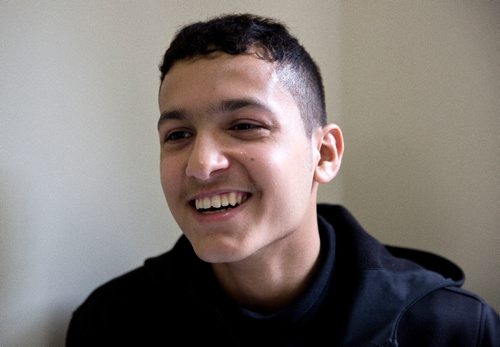 MIKE DEAL / WINNIPEG FREE PRESS
Omar, 15, at a potluck supper hosted by Refuge Winnipeg for the three Syrian refugee families who arrived here last October and all the people who privately sponsored them Monday afternoon at the First Unitarian Universalist Church of Winnipeg.
161010 - Monday, October 10, 2016 - 

