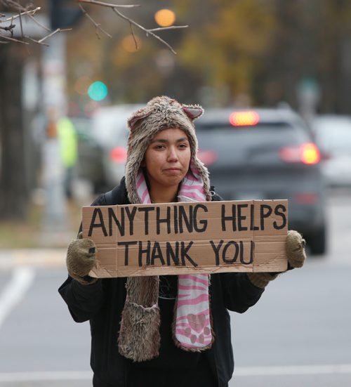 WAYNE GLOWACKI / WINNIPEG FREE PRESS

Mappy Troller,29, is  homeless. She is on Maryland St. trying raise money. The Social Planning Council has a plan to end youth homelessness in Winnipeg.  Alex Paul  story Oct. 11 2016