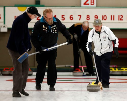 WAYNE GLOWACKI / WINNIPEG FREE PRESS


Curler Fraser Muldrew delivers rock as sweepers Tom Goodhand,left, and Milton Muldrew prepare to sweep it into the house in the Granite Masters Curling league action at the Granite Curling Club Thursday.  Doug Speirs   storyOct. 13 2016