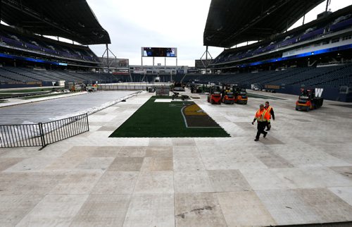 WAYNE GLOWACKI / WINNIPEG FREE PRESS

  Investors Group Field is transforming into a hockey venue for the 2016 NHL Heritage Classic Alumni Game, taking place on Saturday, October 22,  and the 2016 Tim Hortons NHL Heritage Classic will be held on Sunday, October 23.  Sheets are being placed to protect the field. Randy Turner story Oct. 14 2016