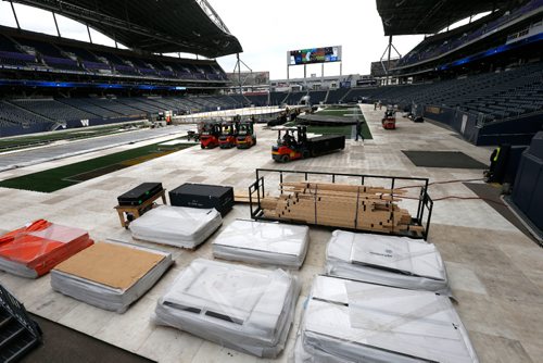 WAYNE GLOWACKI / WINNIPEG FREE PRESS

  Investors Group Field is transforming into a hockey venue for the 2016 NHL Heritage Classic Alumni Game, taking place on Saturday, October 22,  and the 2016 Tim Hortons NHL Heritage Classic will be held on Sunday, October 23.  In the forground is the plexi glass to go around the rink.  Randy Turner story Oct. 14 2016