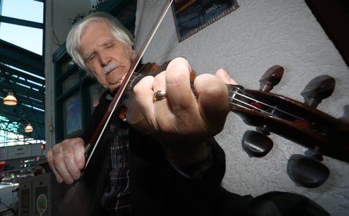 TREVOR HAGAN / WINNIPEG FREE PRESS
Bill Derksen, a retired university music professor, busking at The Forks, Saturday, October 15, 2016.