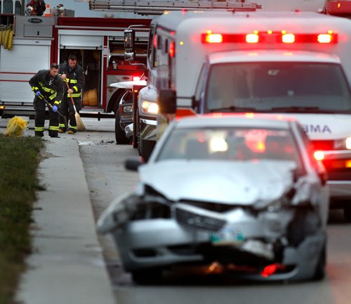 WAYNE GLOWACKI / WINNIPEG FREE PRESS

Winnipeg Fire Fighters and Paramedics at the scene of a two vehicle head on collision in the south bound lane of King Edward St. at Skinner Rd. Tuesday morning. Unknown if any one was injured.   Oct. 18 2016
