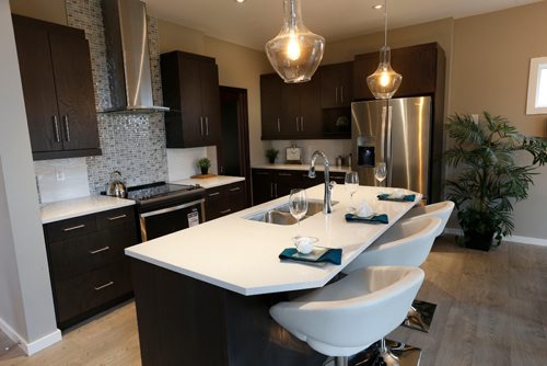 WAYNE GLOWACKI / WINNIPEG FREE PRESS

Homes. The kitchen in 3 Snowberry Circle in Sage Creek.   The Kensington Homes sales rep is  Rene Giroux. Todd Lewys story   Oct. 18 2016