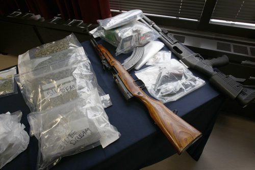 JOE BRYKSA / WINNIPEG FREE PRESSThree police services from Manitoba displayed seized items from project Derringer in Brandon, Manitoba Oct 12-15, 2016- Items seized included firearms, cash , vehicles , and drugs- Seized  Marijuana seized along with shotgun, handgun, and 7.62 SKS assault style rifle and ammunition on display at RCMP D Division headquarters in Winnipeg  -Oct 19, 2016 -(See Carol Sanders story)