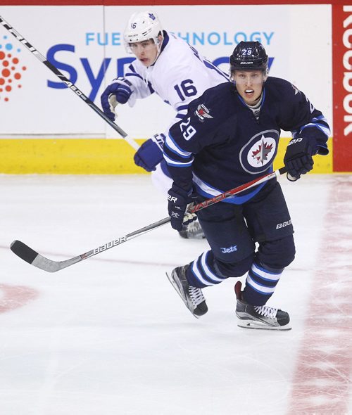 MIKE DEAL / WINNIPEG FREE PRESS

Winnipeg Jets' Patrik Laine (29) and the Toronto Maple Leafs' Mitchell Marner (16) during the game at the MTS Centre Wednesday evening. 

161019
Wednesday, October 19, 2016