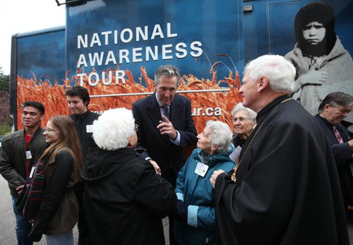 RUTH BONNEVILLE / WINNIPEG FREE PRESS

Premier Brian Pallister talks to members of the Ukrainian community including survivors of Holodomor genocide in front of the new mobile Holodomor Classroom (a state-of-the-art RV interactive mobile theatre) in front of the Provincial Legislative Building during the official Kick-Off of the Manitoba portion of the National Awareness Tour Thursday.  
 
The Holodomor was a genocide carried out in 1932-33 by the Soviet Union led by Joseph Stalin, which resulted in the deaths of millions of Ukrainians due to forced starvation. 

See Nick Martin story.

October 20, 2016