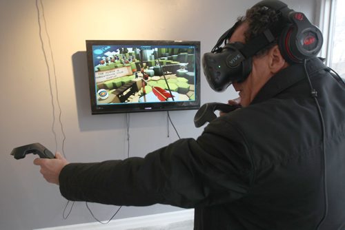 JOE BRYKSA / WINNIPEG FREE PRESSWinnipeg Free Press reporter Martin Cash tries out Winnipegs first Virtual Reality Arcade at 703 Corydon Ave- called The Portal -Oct 20, 2016 -(See Martin Cash story)