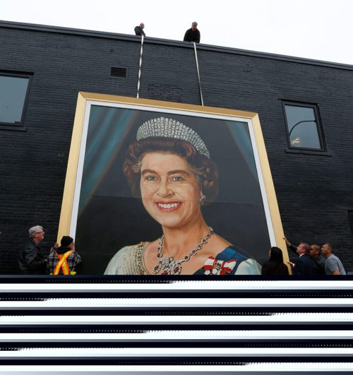 WAYNE GLOWACKI / WINNIPEG FREE PRESS

The huge painting of Queen Elizabeth II from the old Winnipeg Arena is placed against the wall of The Pint on Garry St. Thursday afternoon in the lead up to this weekend's Heritage Classic hockey games.  Kevin Rollason story  Oct. 20 2016