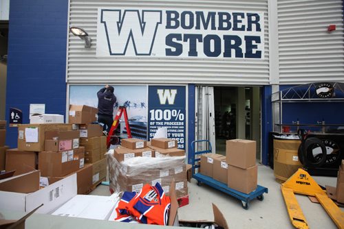 
RUTH BONNEVILLE / WINNIPEG FREE PRESS

Merchandisers box up Bomber merchandise to make room for NHL Heritage Classic gear at Investors Group Field for the upcoming Heritage Classic outdoor Hockey tournament being held at the stadium this weekend in Winnipeg.  

Standup photo 
October 20, 2016