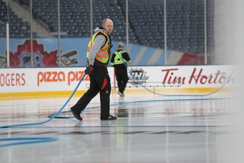 
RUTH BONNEVILLE / WINNIPEG FREE PRESS

The final touches are being made to prepare the ice on the hockey rink in the centre of Investors Group Field for the upcoming Heritage Classic outdoor Hockey tournament being held at the stadium this weekend in Winnipeg.  

Standup photo 
October 20, 2016