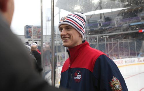 
RUTH BONNEVILLE / WINNIPEG FREE PRESS

Winnipeg Jets player Tyler Myers is interviewed by reporters next to the hockey rink set up in the middle of Investors Group Field for the upcoming Heritage Classic outdoor Hockey tournament being held at the stadium this weekend in Winnipeg.  


October 20, 2016