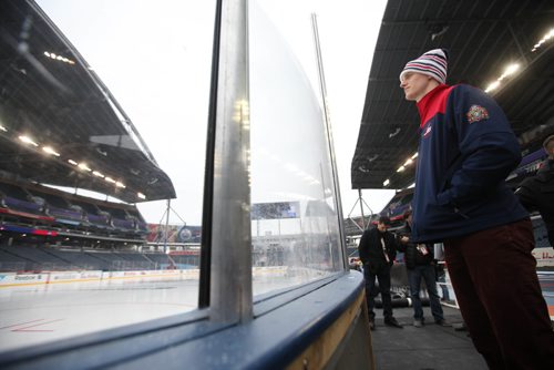 
RUTH BONNEVILLE / WINNIPEG FREE PRESS

Winnipeg Jets player Tyler Myers looks out at the hockey rink set up in the middle of Investors Group Field for the upcoming Heritage Classic outdoor Hockey tournament being held at the stadium this weekend in Winnipeg.  


October 20, 2016