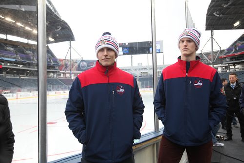 
RUTH BONNEVILLE / WINNIPEG FREE PRESS

Winnipeg Jets players Tyler Myers (right) and Patrik Laine stand next to the rink at  Investors Group Field after a media scrum at ringside for the upcoming Heritage Classic outdoor Hockey tournament being held at the stadium this weekend in Winnipeg.  


October 20, 2016