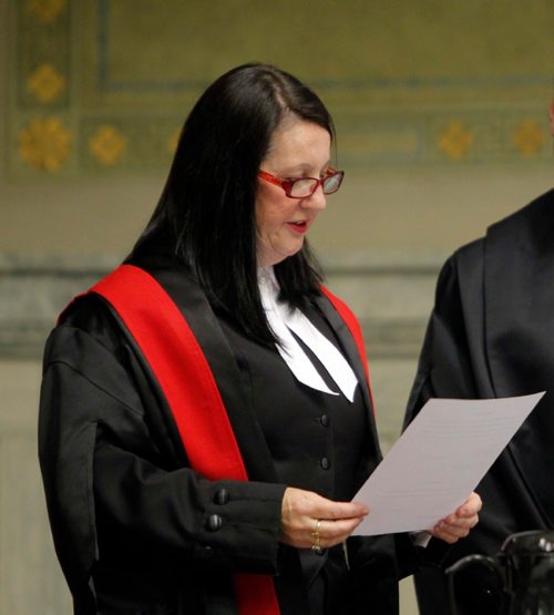 BORIS MINKEVICH / WINNIPEG FREE PRESS
Swearing-in ceremony for The Honourable Chief Judge Margaret Wiebe to the Provincial Court of Manitoba at the Winnipeg Law Courts Complex, 408 York Avenue. Here she reads the oath of office.  Oct. 21, 2016